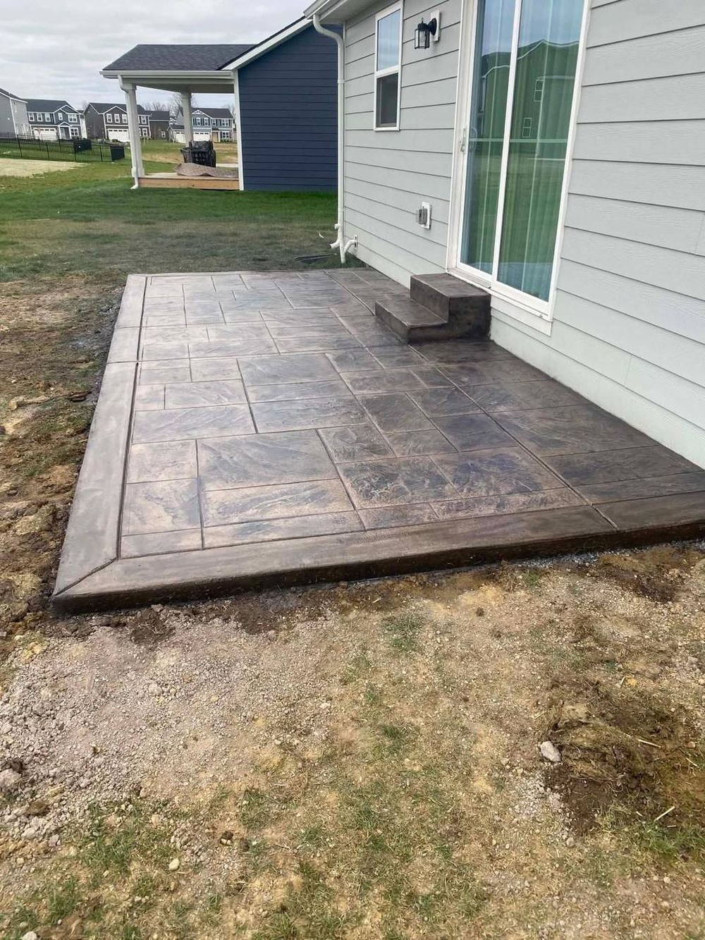 Stamped concrete patio with steps